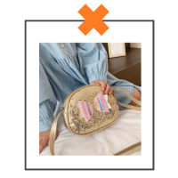 Gouden paillettentasje met strik